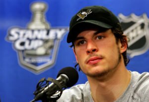 PITTSBURGH - MAY 13: Sidney Crosby #87 of the Pittsburgh Penguins is interviewed by the media after his team's 4-1 victory over the Philadelphia Flyers in game three of the Eastern Conference Finals of the 2008 NHL Stanley Cup Playoffs at Wachovia Center on May 13, 2008 in Philadelphia, Pennsylvania. The Penguins lead the series 3-0. (Photo by Jim McIsaac/Getty Images)